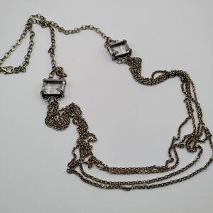 SILVER AND CRYSTAL LONG MULTI CHAIN NECKLACE.